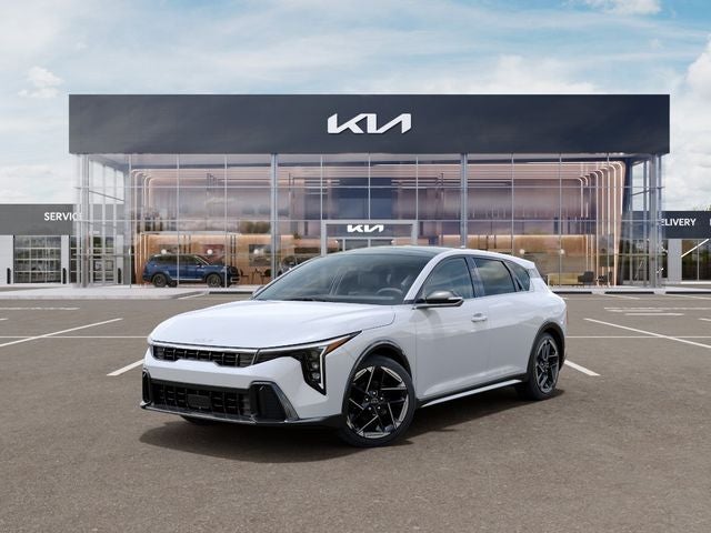 2026 Kia K4 GT-Line in Snow White Pearl — front three-quarter view