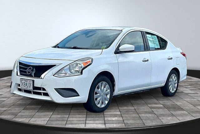 2017 Nissan Versa 1.6 SV in Fresh Powder — front three-quarter view