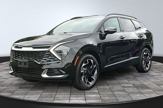 2023 Kia Sportage SX-Prestige in Ebony Black — front three-quarter view