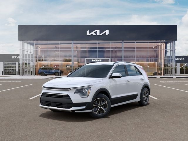 2026 Kia Niro EX in Snow White Pearl — front three-quarter view