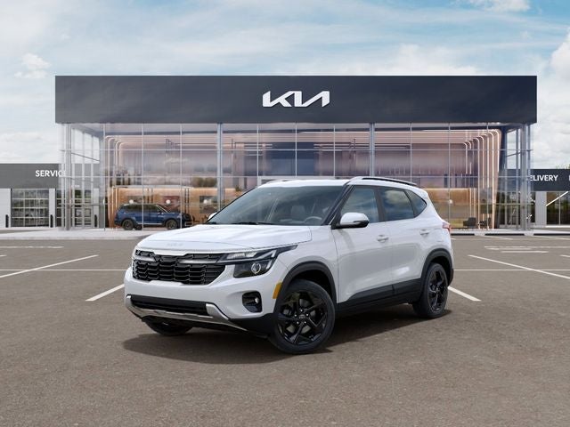 2026 Kia Seltos EX in Snow White Pearl — front three-quarter view