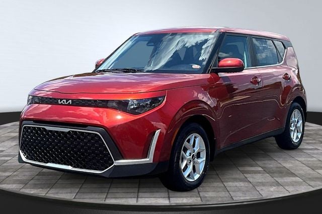 2023 Kia Soul LX in Mars Orange — front three-quarter view