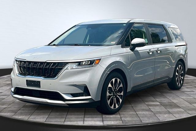 2022 Kia Carnival EX in Ceramic Silver — front three-quarter view