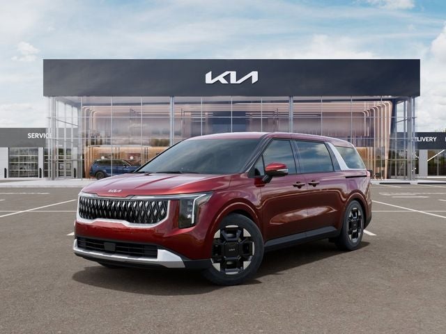 2026 Kia Carnival EX in Flare Red — front three-quarter view