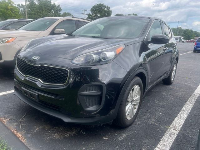 2017 Kia Sportage LX in Black Cherry — front three-quarter view
